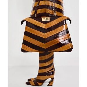 New Season
Fendi
Fendi Arco Two-Toned Knee-High Boots